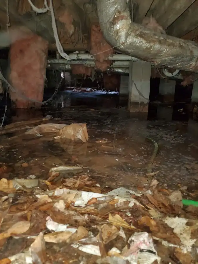 Crawl space flood assessment for Commercial Water Damage Restoration in Summerfield