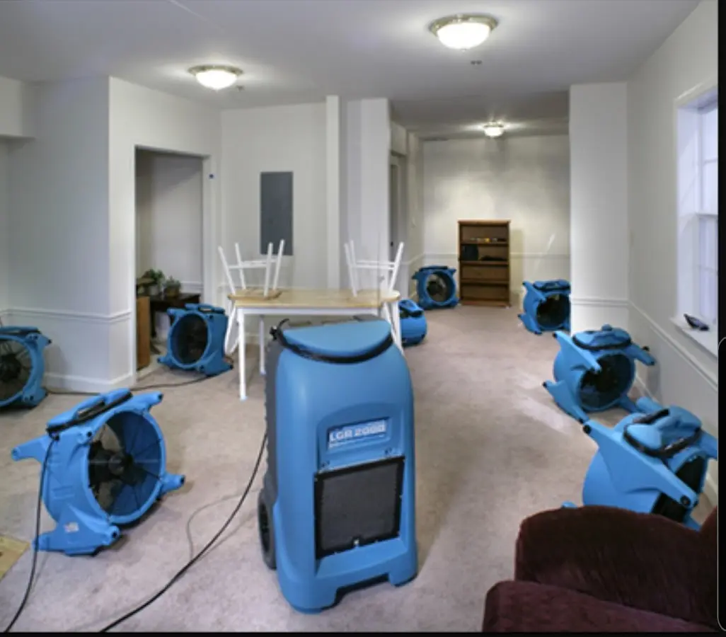 Air movers and dehumidifier setup for Water Damage Restoration in Summerfield